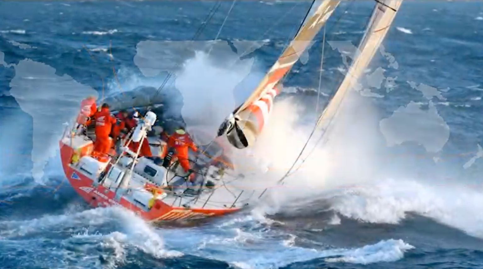 An orange sailboat leans over in heavy waves.