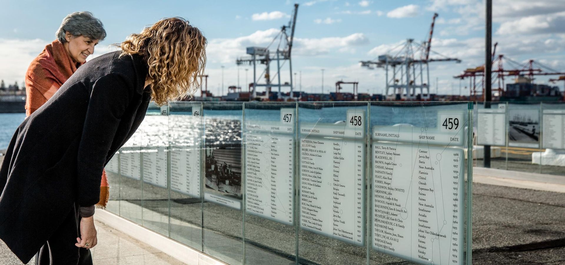 Outside the Museum, the glass and metal panels are where names of migrants, their dates of arrival and their ships are listed.
