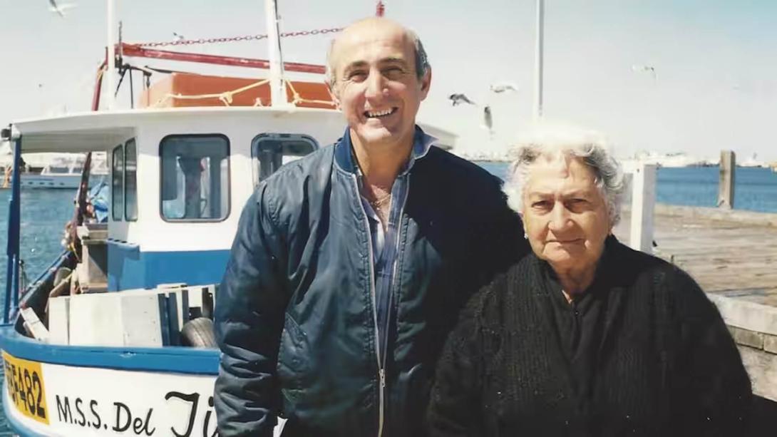 A more recent colour photo of Jim, Rosa and the fishing boat at dock.