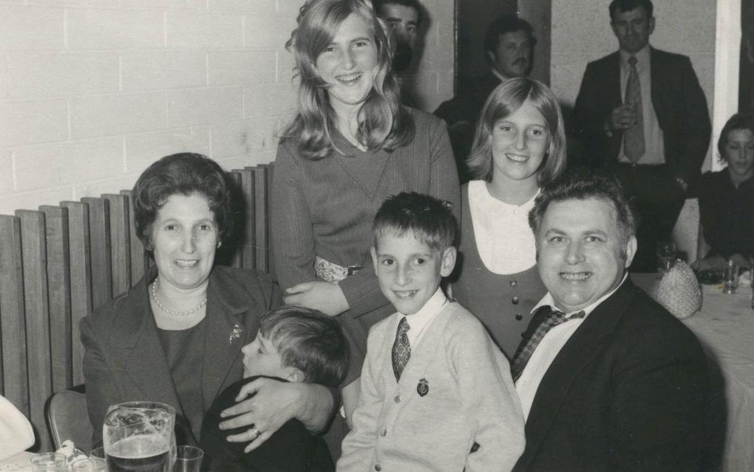 The family look to be having a great time though the youngest is tired on Maria's lap.