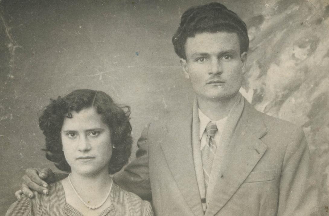 Old studio portrait of Francesco with arm around Giuseppina's shoulder.