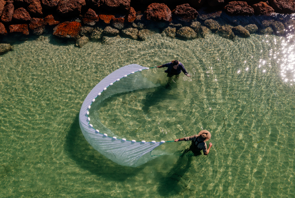 Two people at Emu Point Net Fishing
