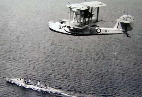 HMAS Sydney (II) - Port side with Walrus overhead