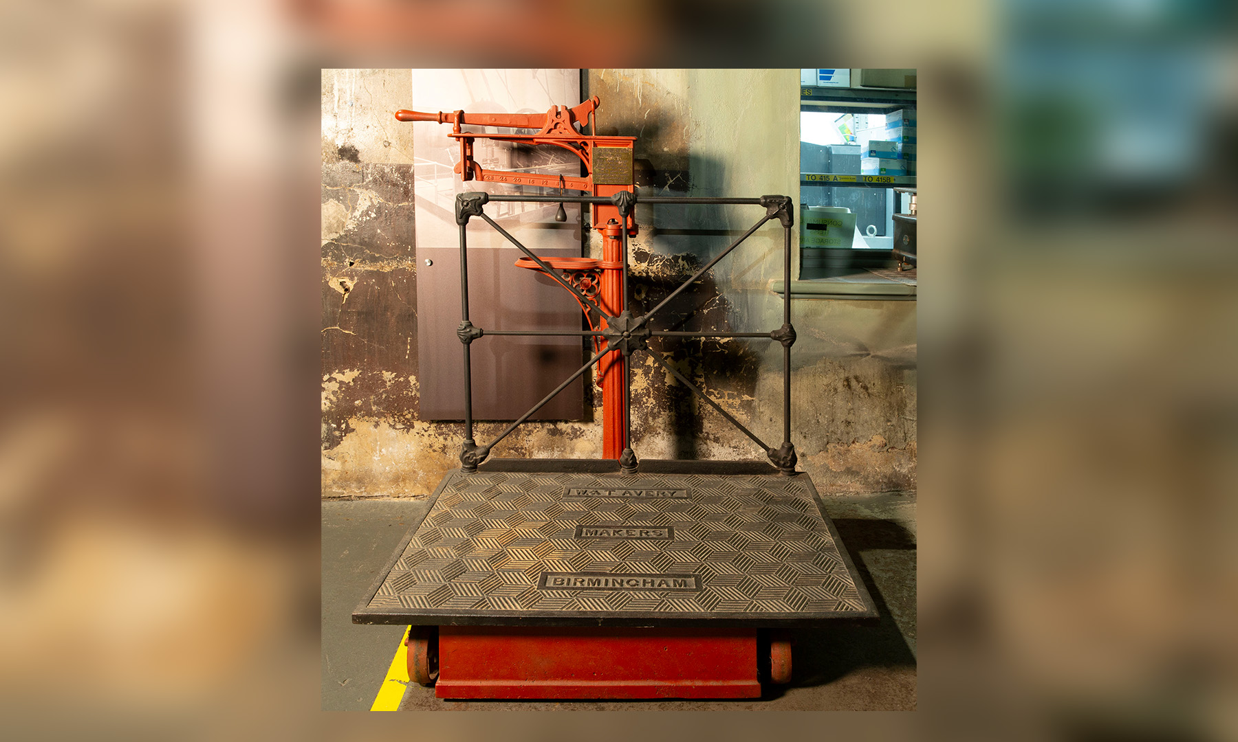 metal platform scales made by 'W&T Avery, Birmingham', with base and arm painted red