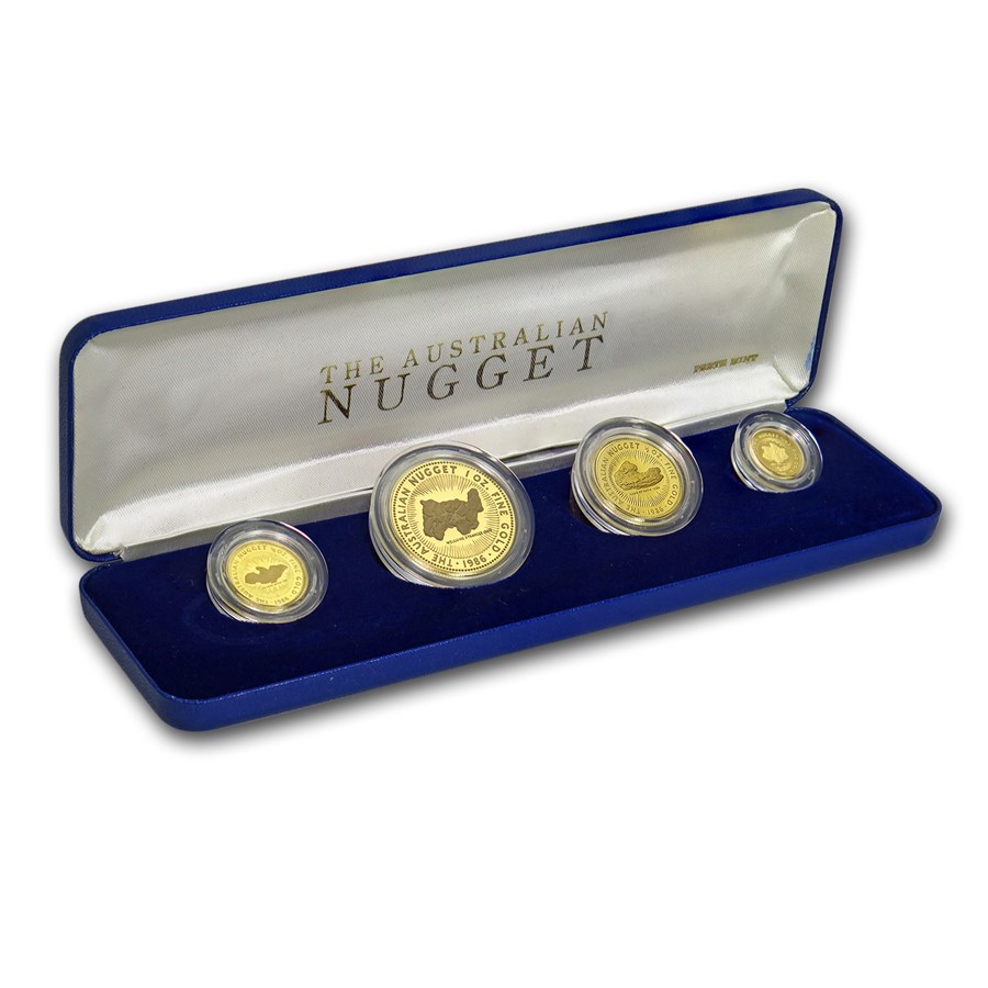 A long rectangular blue case with white satin lining with 'The Australian Nugget' contains four gold coins with central designs of gold nuggets.