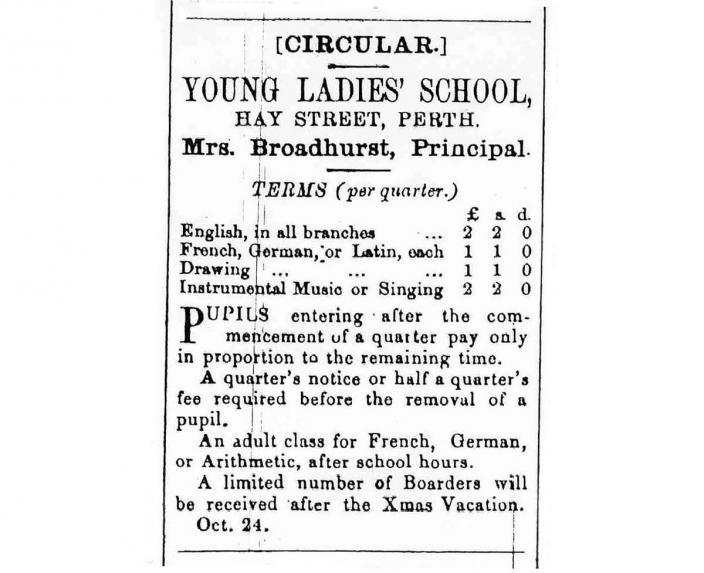Photo of text form a newspaper of the Young Ladies School advert, listing the costs and types of lessons.