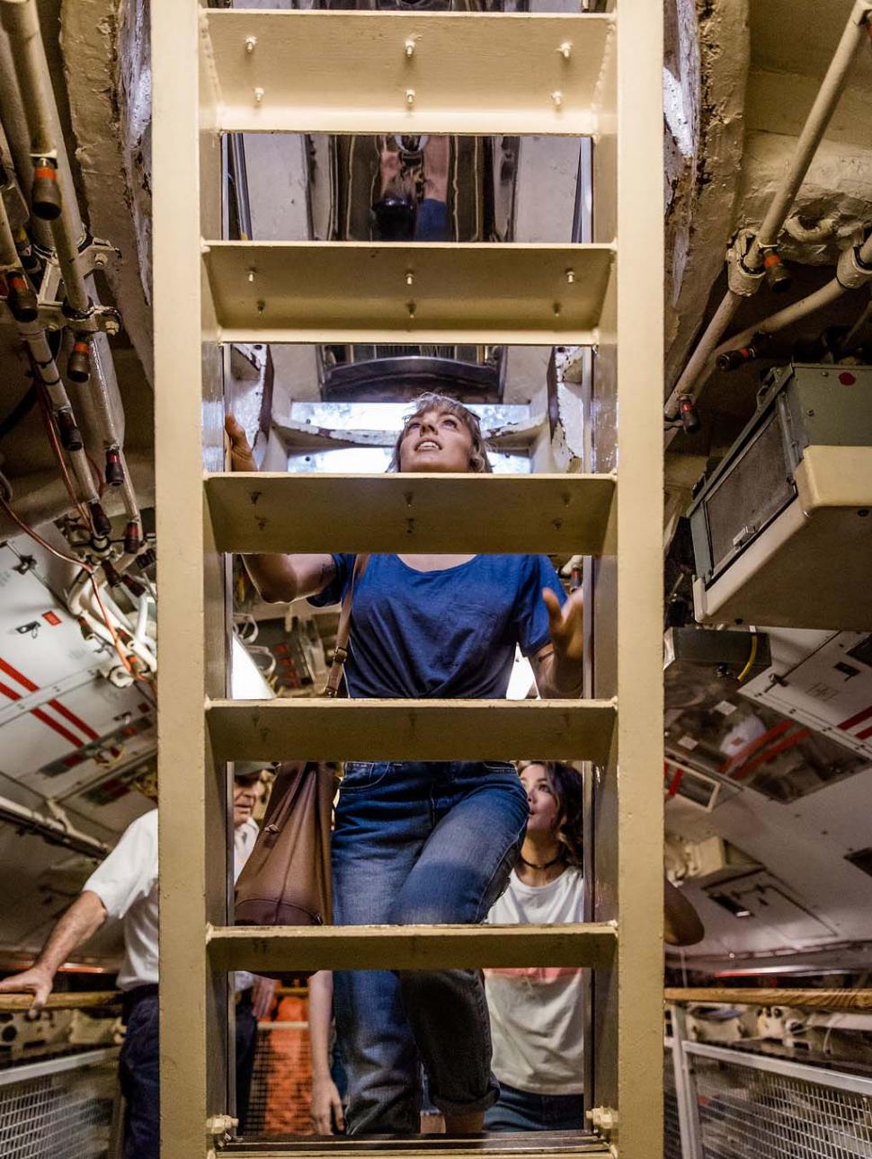 Person climbing ladder